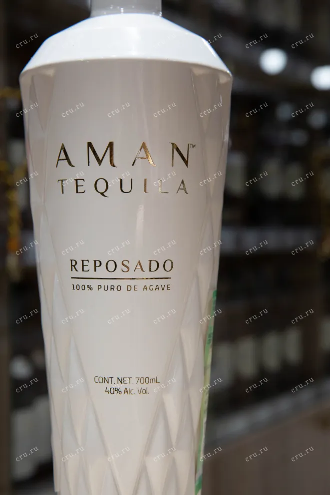 Этикетка Aman Tequila Reposado 0.7 л