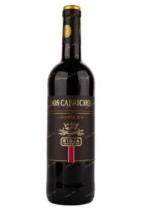 Вино Dos Caprichos Crianza 2019 0.75 л